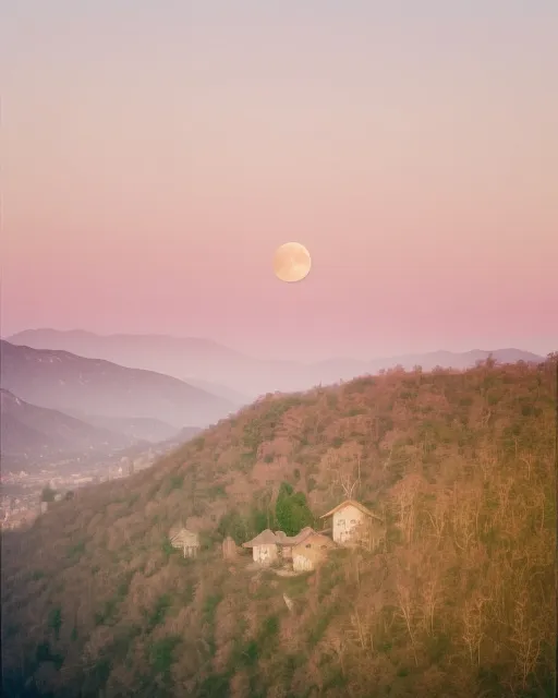 Hyper realistic pink full moon over a valley rising with a village in the distance 