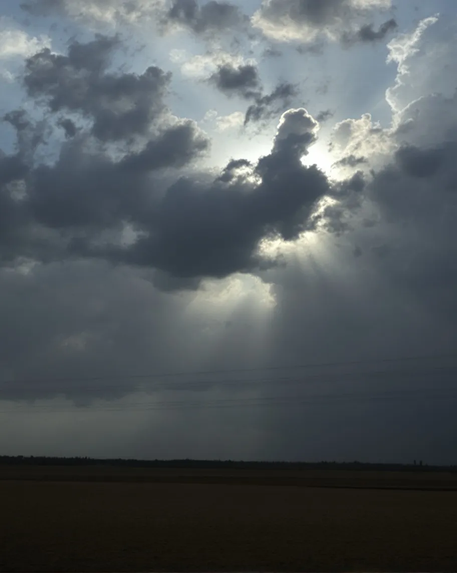 A rainy sky over field sunny on - Free AI Photo Generator - starryai